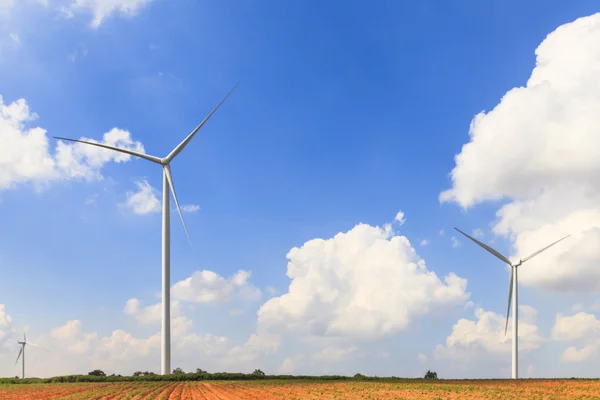 Wind turbine renewable energy source summer landscape with blue sky — Stock Photo, Image