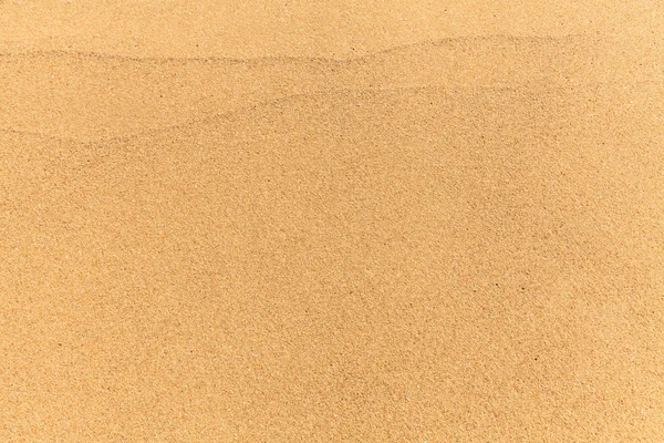 Текстура фону піщаного пляжу — стокове фото