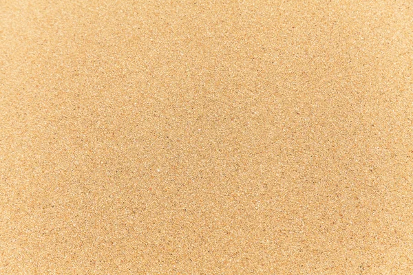 Sandstrand bakgrundsstruktur — Stockfoto