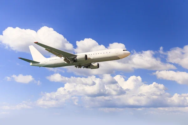 Airplane in the sky, transportation, travel, shipping. Stock Photo