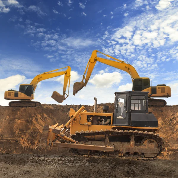 Excavator and grader — Stock Photo, Image