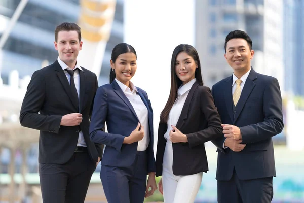 Four Executives Row Business Team Standing Front Modern Office Leadership — Stock Photo, Image