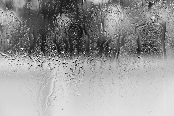 Дощ на склі — стокове фото