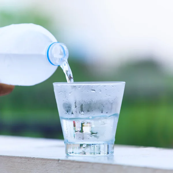 Pouring water — Stock Photo, Image