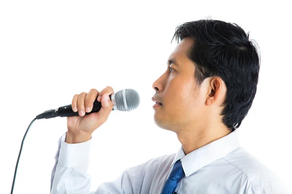 Hand holding a microphone — Stock Photo, Image