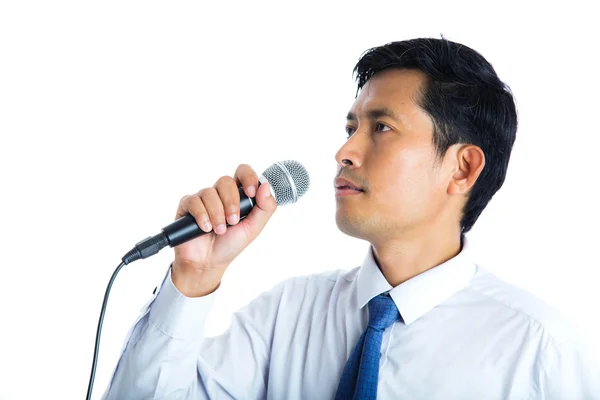 Hand holding a microphone — Stock Photo, Image