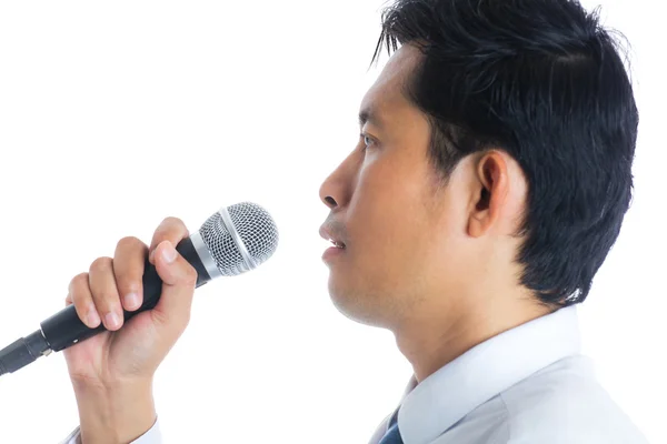 Hand holding a microphone — Stock Photo, Image