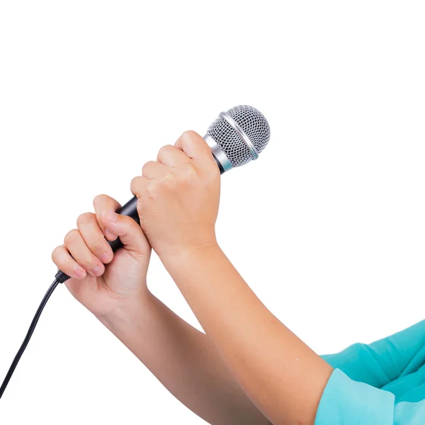 Female hand holding microphone — Stock Photo, Image