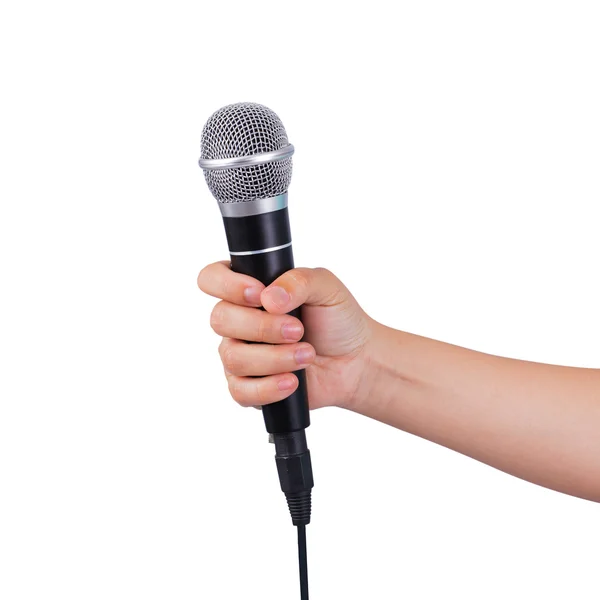 Female hand holding microphone — Stock Photo, Image