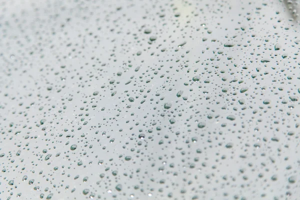 Cam arka plan dokusu üzerinde yağmur — Stok fotoğraf