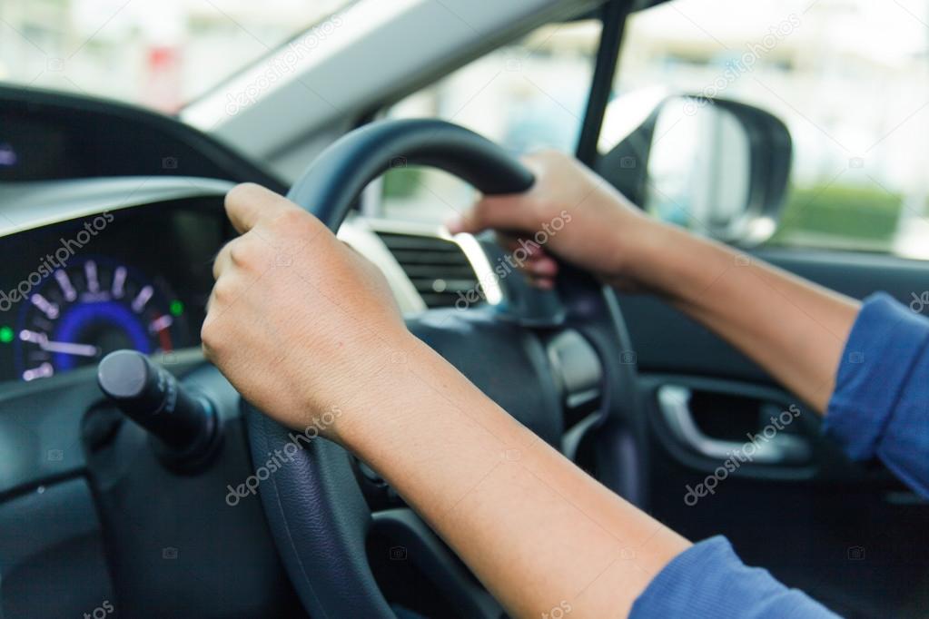 Close Up of Driving a car