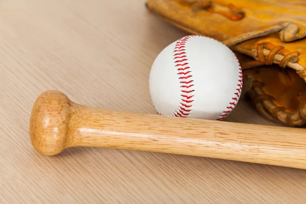 Baseball equipment on wood background