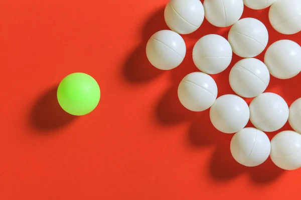 Green ball and white balls — Stock Photo, Image