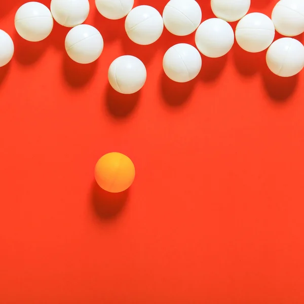 Orange ball and white balls — Stock Photo, Image