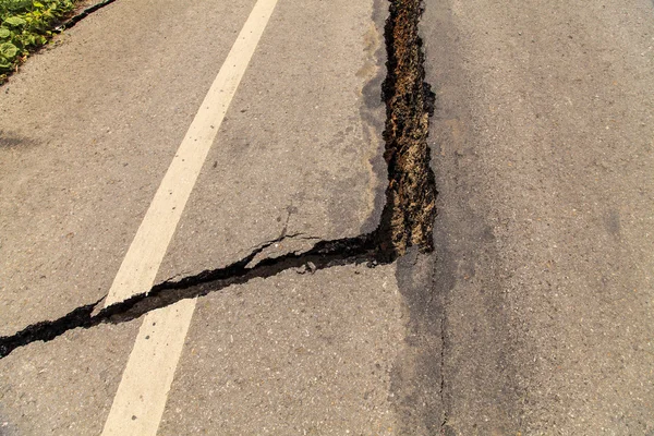 Cracked of asphalt road — Stock Photo, Image