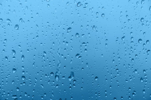 Pioggia su vetro, texture di sfondo — Foto Stock