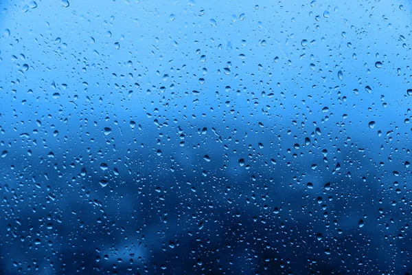 Chuva em vidro, textura de fundo — Fotografia de Stock