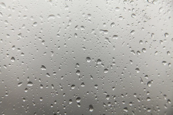 Regen op glas, achtergrondstructuur — Stockfoto