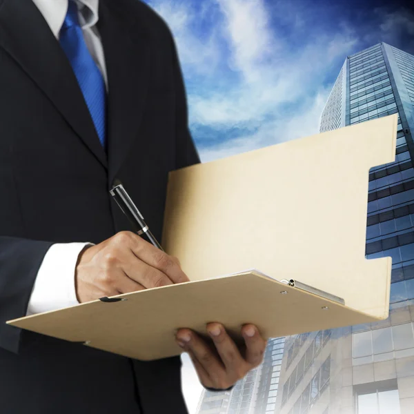 Businessman and city working with documents sign up contract — Stock Photo, Image