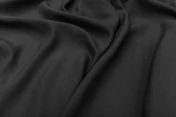 Černé tkaniny textury pozadí — Stock fotografie