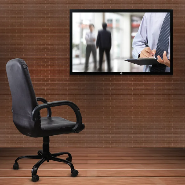 Office chair and TV screen — Stock Photo, Image