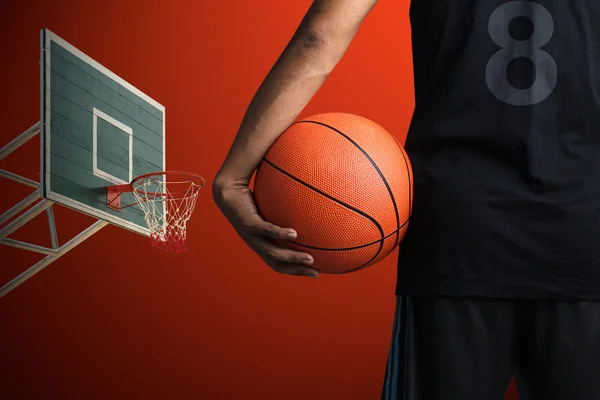 Close-up of basketball player with a ball — Stock Photo, Image