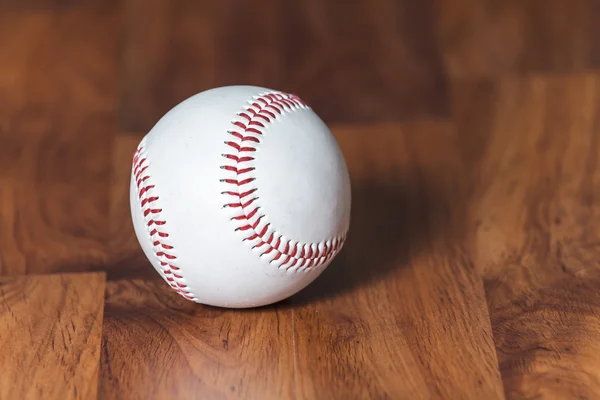 Baseball ball on wood background — Stock Photo, Image