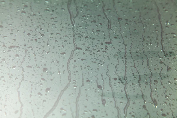 Gotas de lluvia sobre vidrio Textura de fondo —  Fotos de Stock