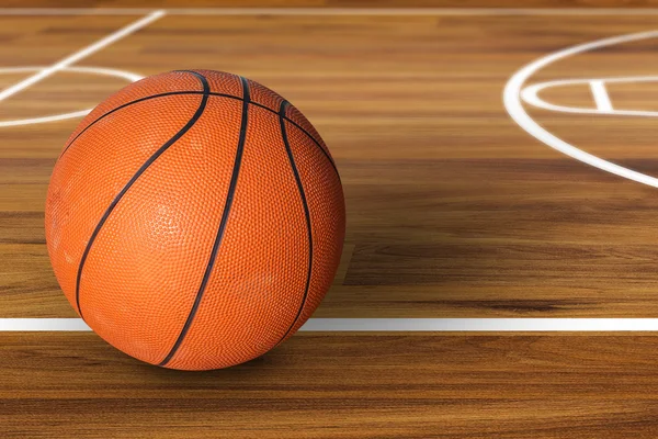 Baloncesto pelota sobre pista de baloncesto de madera dura —  Fotos de Stock