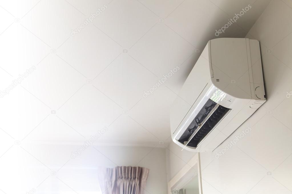 Air conditioner on wall background