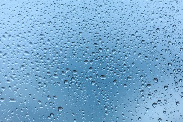 Regentropfen auf Glashintergrund — Stockfoto