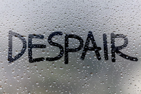Despair concept on glass surface — Stock Photo, Image