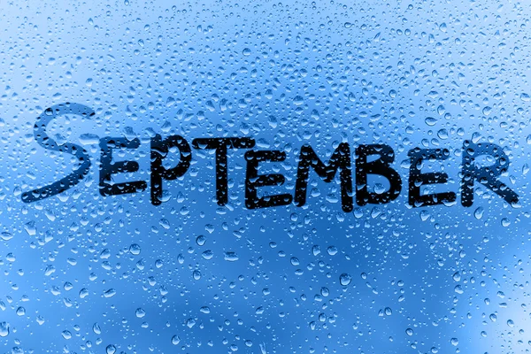 Lseptember concept on glass surface — Stock Photo, Image