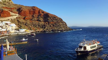 small harbor of akrotiri on greece island santorini clipart