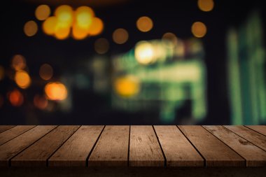 ahşap masa üstü arka arka plan bulanık kafe ışıkların 