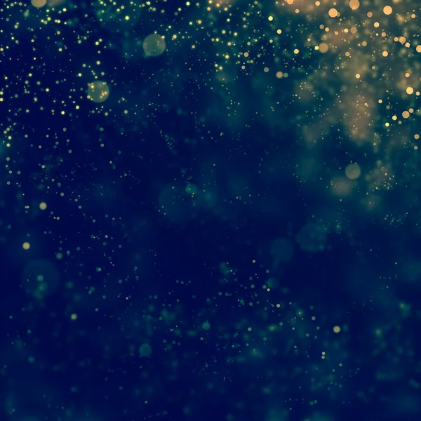 Glittering stars on bokeh background — Stock Photo, Image