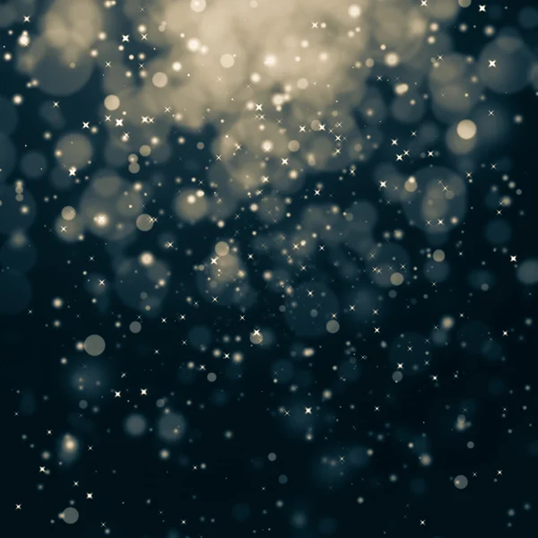 Glittering stars on bokeh background — Stock Photo, Image