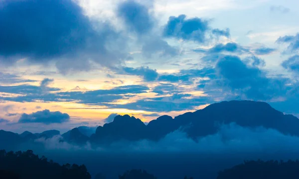 Sunrise over the mountains cloud and fog — Stock Photo, Image