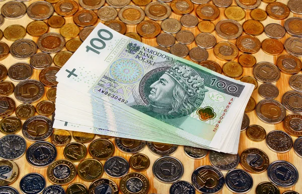 Dinheiro polonês na madeira — Fotografia de Stock