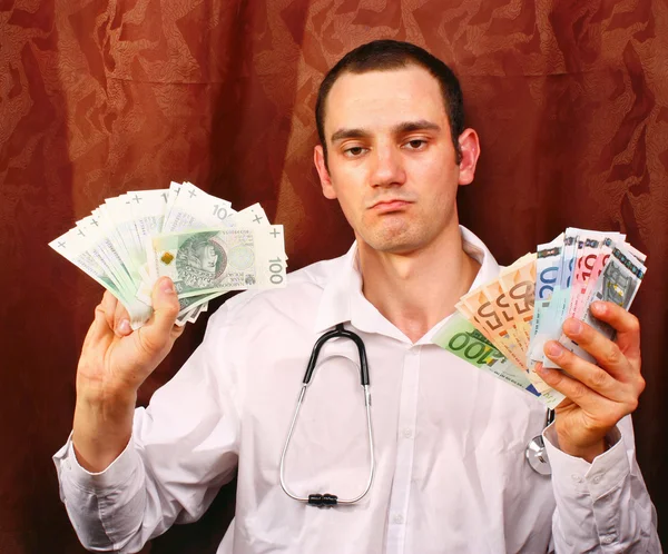 Dokter euro salaris hebben, Pools geld — Stockfoto