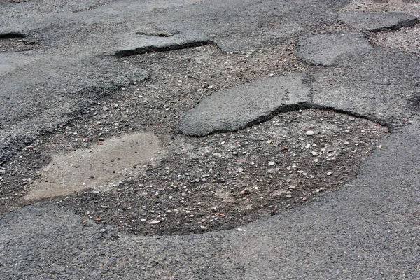 Strada asfaltata danneggiata — Foto Stock