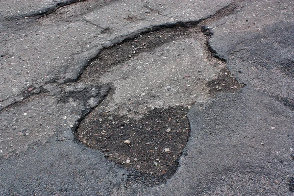 Schlechter Straßenasphalt — Stockfoto