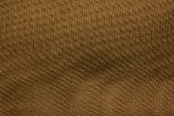 Gold dunkles Tuch Textur Hintergrund — Stockfoto