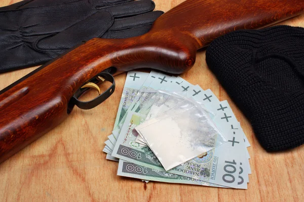 Zakken van drugs, euro geld en pistool — Stockfoto