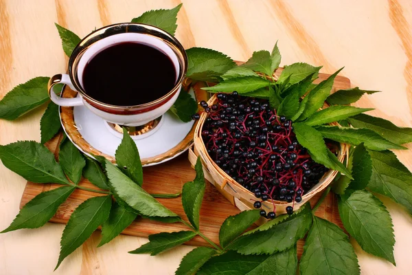 Fresh cup tea fruit elderberry — Stock Photo, Image