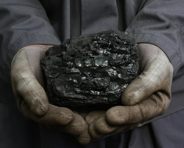 Uhlí v rukou — Stock fotografie