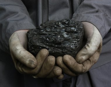 Coal in the hands clipart