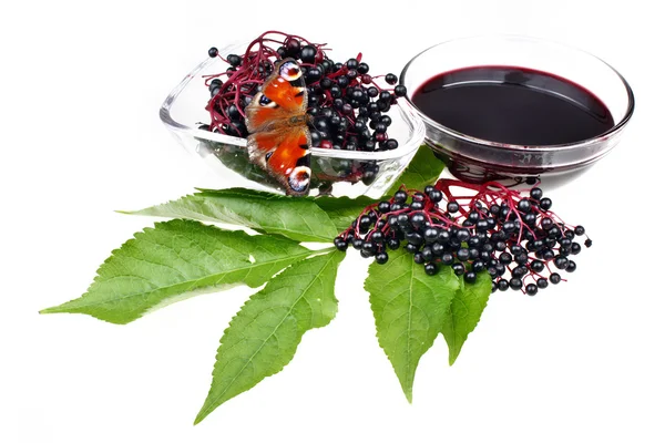 Fruit juice elderberry and butterfly — Stock Photo, Image