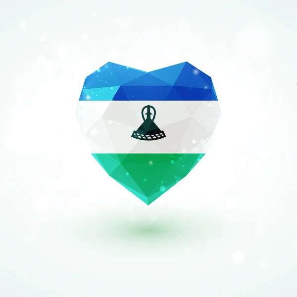 Drapeau du Lesotho en forme de coeur en verre diamant. Style de triangulation — Image vectorielle