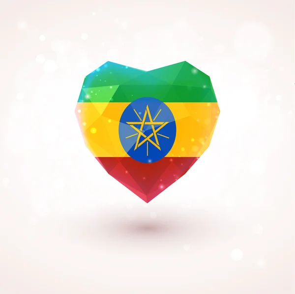 Drapeau de l'Ethiopie en forme de coeur en verre diamant. Style de triangulation — Image vectorielle